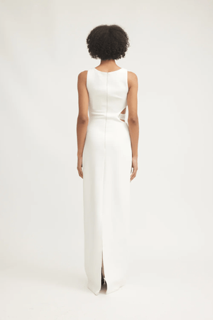 Valentina Dress Ivory by Tojhà – A sophisticated maxi in ultra-soft crepe with boat neckline, curved cut-out, and mesh detail, perfect for elegant evening occasions.