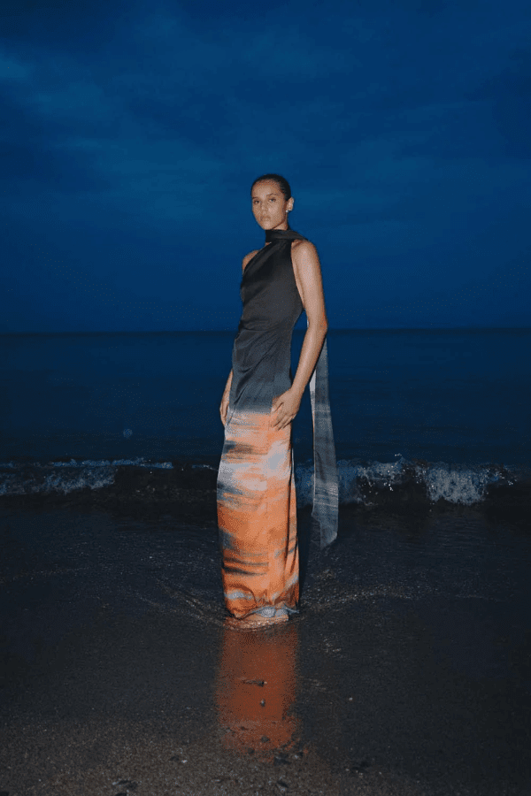 Ari Dress Tigre by Baobab – A bold, elegant one-shoulder maxi with ruched texture and scarf accent, perfect for making a trendy statement at evening events.