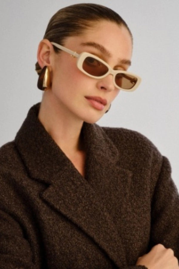 Bella Beige Sunglasses by Luv Lou – a slim rectangular frame with khaki brown lenses and gold hardware. Perfect for timeless everyday wear.