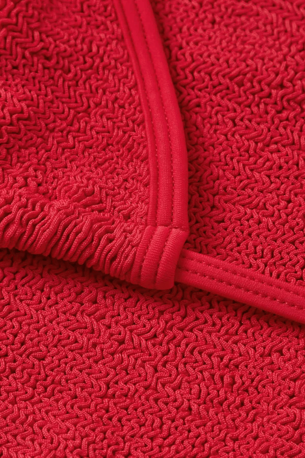 Gina Bikini Red by Hunza G – Signature triangle bikini with light support and side ties, crafted in sculpting one-size crinkle fabric