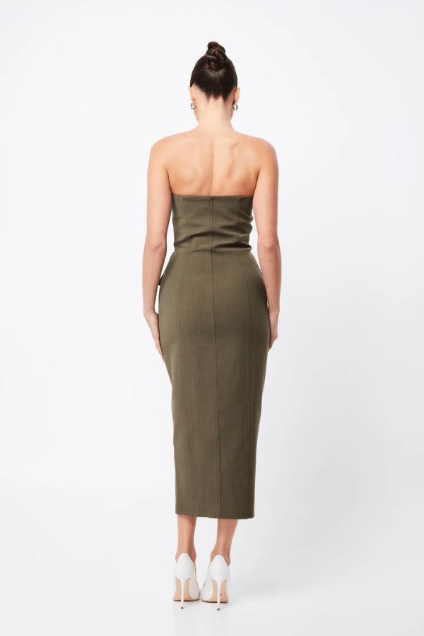 Low Profile Midi Dress Khaki by Mossman – A chic, strapless utility-inspired midi with exposed zip, front pockets, and back split, perfect for modern, versatile styling.