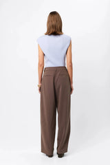 Quiet Force Top by Mossman in sky blue, ribbed sleeveless turtleneck with removable shoulder pads for sleek everyday styling.
