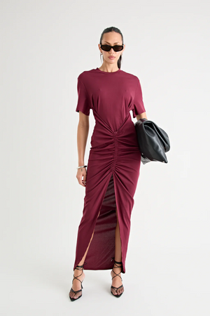 Niko Maxi Dress Burgundy by Pfeiffer – Trendy relaxed T-shirt maxi with adjustable side ruching, crew neck, and breathable cotton blend, perfect for elevated off-duty style and everyday comfort.