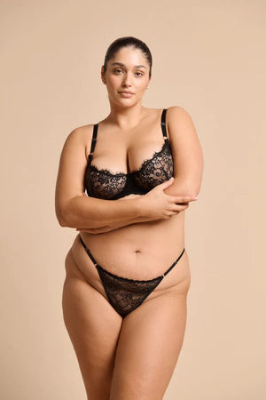 Rosie Thong in Black by Kat the Label, high-cut lace thong with a soft mesh back and adjustable waistband, perfect for comfort and a touch of luxe elegance.