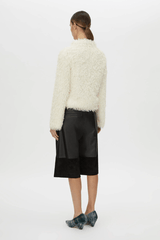 Frieze Mini Dress Cream by Camilla and Marc – Trendy mini with mock neck, removable scarf, and flared extra-long sleeves; perfect for chic day-to-night style.