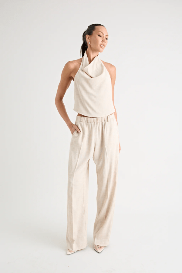 Pino Cowl Top Natural by Pfeiffer – Trendy, soft suiting top with adjustable cowl neckline and cinched back, perfect for chic day-to-night elegance.