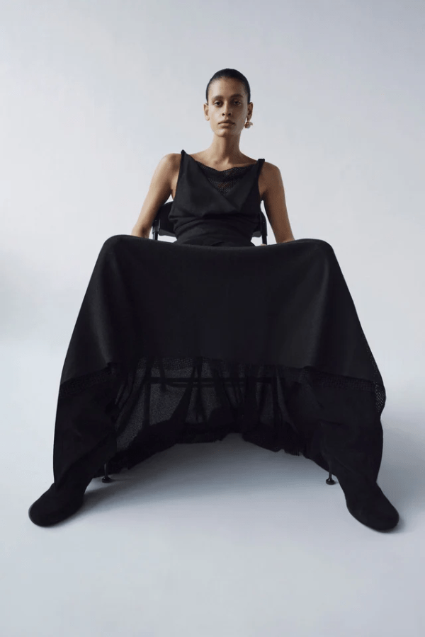 Attar Top Black by Camilla and Marc – draped cowl neck with twisted straps and deep V-back, perfect for elegant dinners or chic evening events.