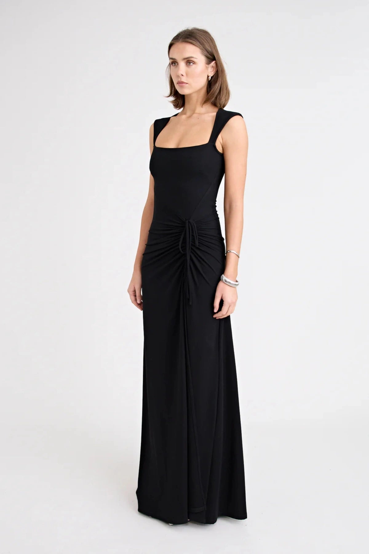 Samara Dress by Pfeiffer — a full-length jersey dress with a square neckline and adjustable front split, perfect for elegant occasions.