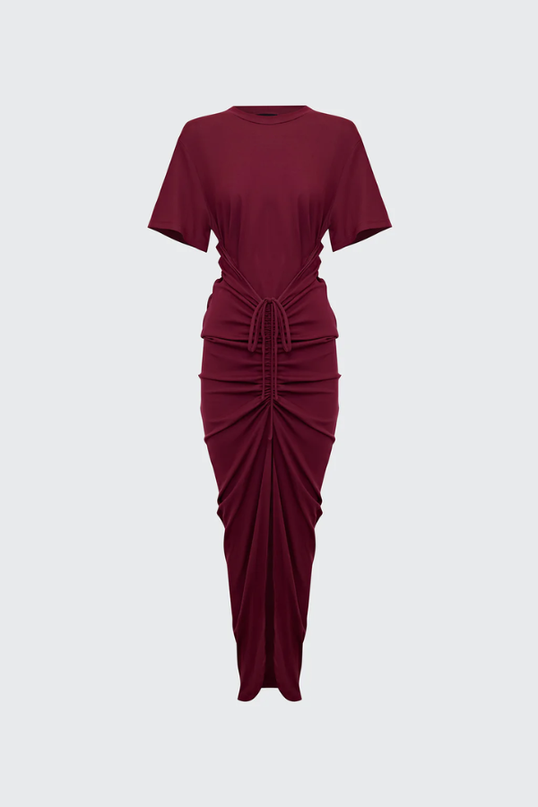 Niko Maxi Dress Burgundy by Pfeiffer – Trendy relaxed T-shirt maxi with adjustable side ruching, crew neck, and breathable cotton blend, perfect for elevated off-duty style and everyday comfort.