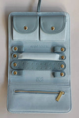 Jewellery Roll Powder Blue by Avant Studio, cross-hatch faux leather with organized pouches. Perfect for stylish travel and gifting.