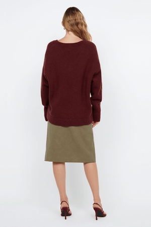 Campbell V Neck Jumper Plum by Bec + Bridge – Soft mohair blend knit with a flattering V neckline, ribbed collar and cuffs. Relaxed fit with dropped shoulders and pull-on style. Cold hand wash.