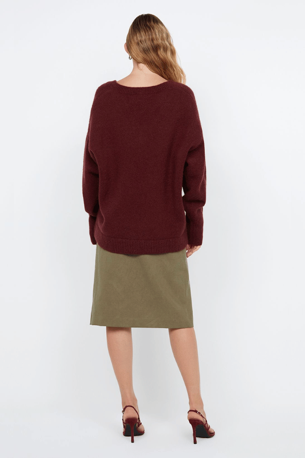 Campbell V Neck Jumper Plum by Bec + Bridge – Soft mohair blend knit with a flattering V neckline, ribbed collar and cuffs. Relaxed fit with dropped shoulders and pull-on style. Cold hand wash.
