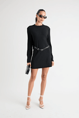 Fairbank Rib Dress Black by Pfeiffer – A trendy, comfortable ribbed bamboo dress with high raw-edge neckline, full sleeves, and versatile two-part back design. Perfect for chic casual wear or layering in cooler seasons.