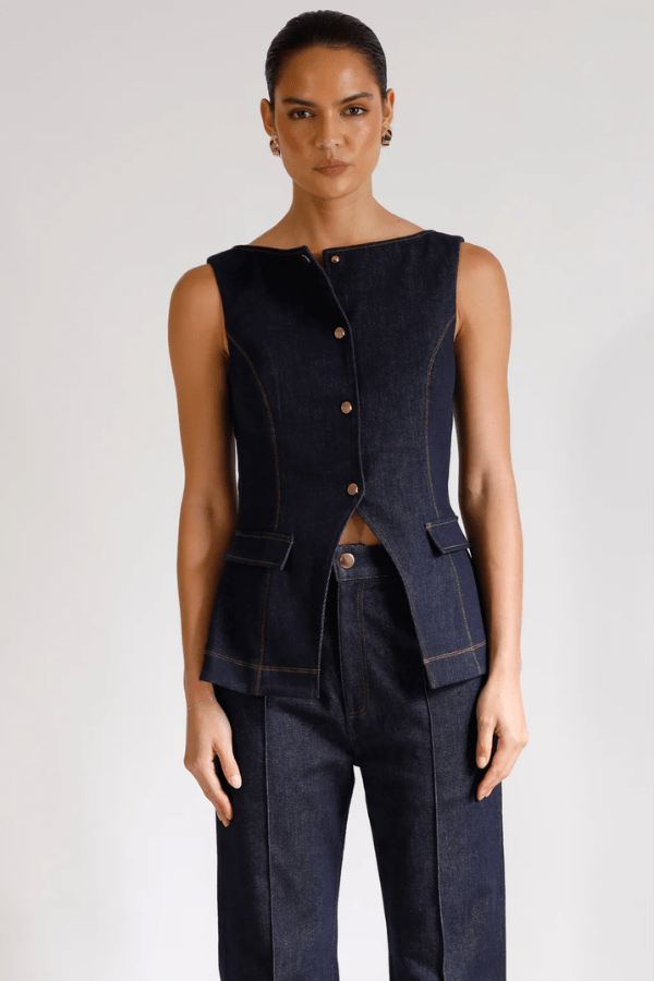 Good Vibes Top Indigo by Pasduchas – Trendy stretch denim with structured fit, gold snap studs, and mock pockets; perfect for chic, coordinated looks.