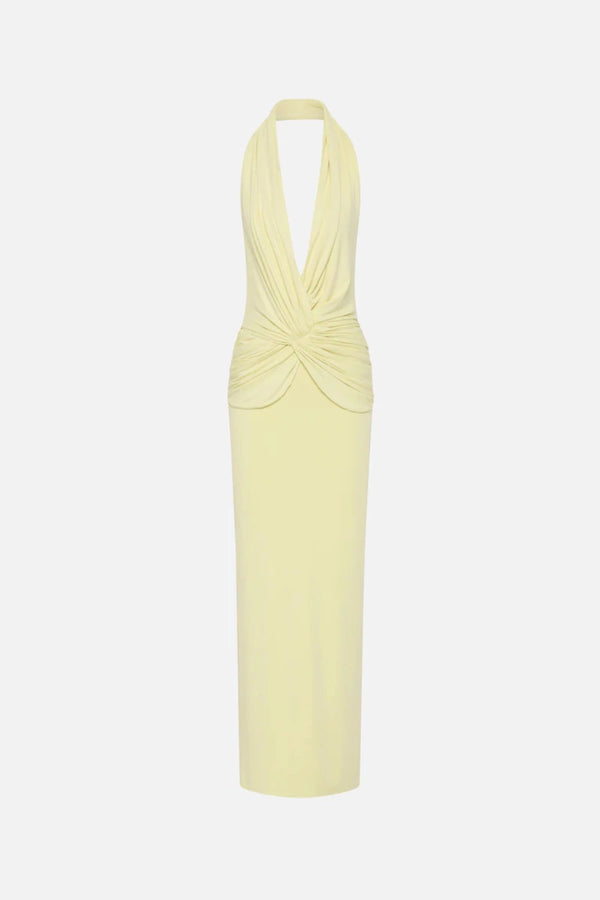 The Cabana Cupro Dress by MISHA, a lemon midi with halter neckline and soft hip drape. Perfect for weddings or refined summer events.