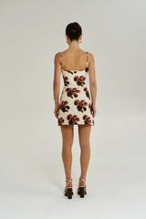 A Line Mini Dress Butter Fleur by Summi Summi – floral A-line mini dress with slim straps and stretch knit fabric.