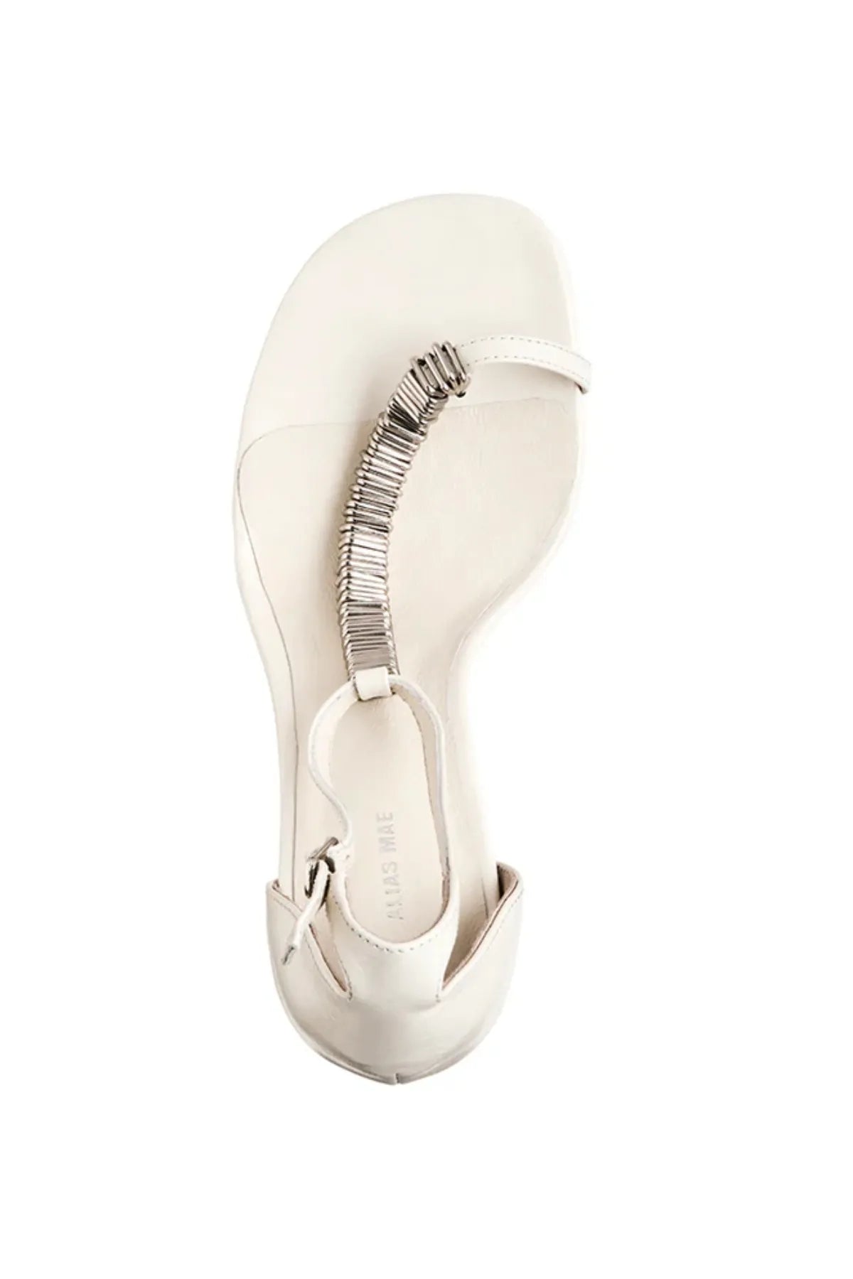 Abel Heel by Alias Mae, a bone leather stiletto with metal T-bar detail and ankle strap. Perfect for weddings or night events.