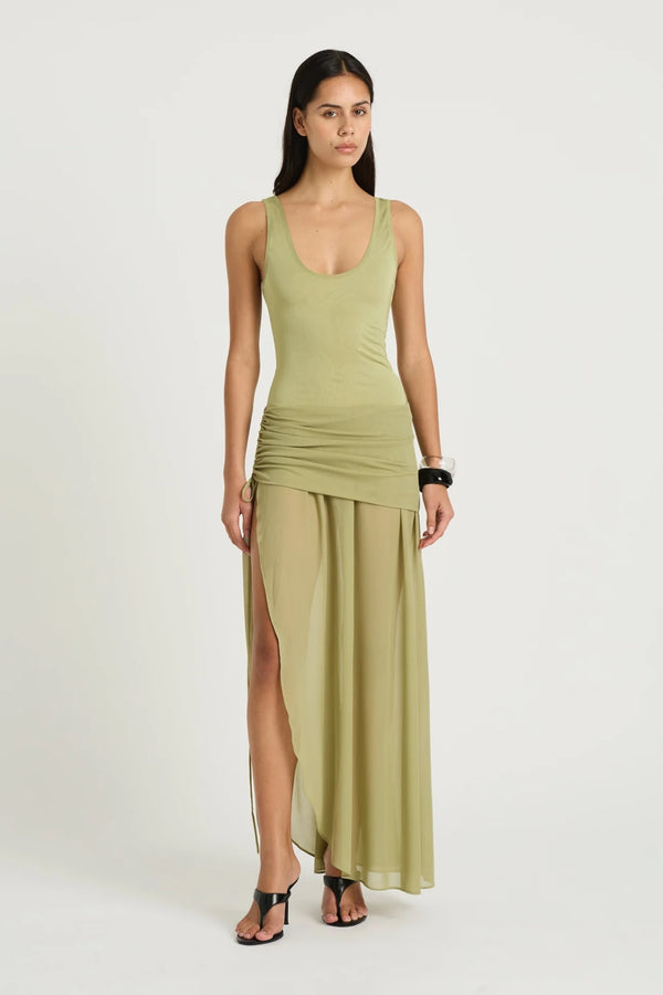 Addison Maxi Dress Pistachio by Benni, sheer scoop-neck maxi with plunge back and ruched tie mini skirt underlay, a chic trendy look for summer events.