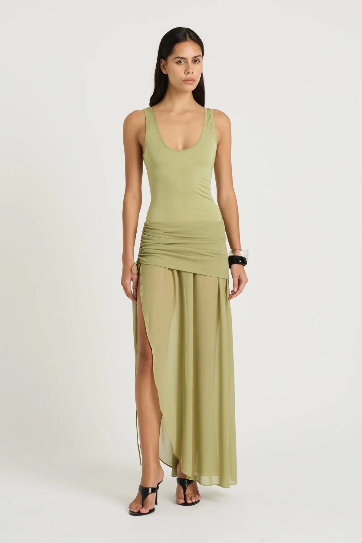 Addison Maxi Dress Pistachio by Benni, sheer scoop-neck maxi with plunge back and ruched tie mini skirt underlay, a chic trendy look for summer events.