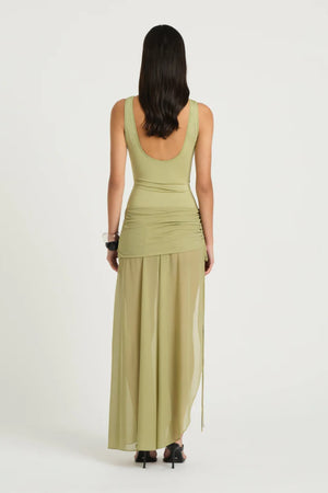 Addison Maxi Dress Pistachio by Benni, sheer scoop-neck maxi with plunge back and ruched tie mini skirt underlay, a chic trendy look for summer events.