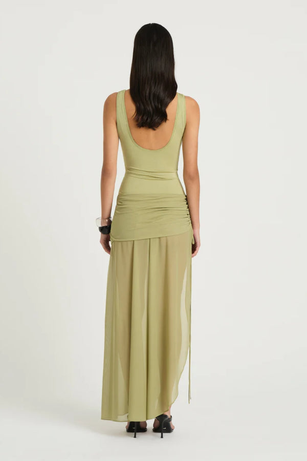 Addison Maxi Dress Pistachio by Benni, sheer scoop-neck maxi with plunge back and ruched tie mini skirt underlay, a chic trendy look for summer events.