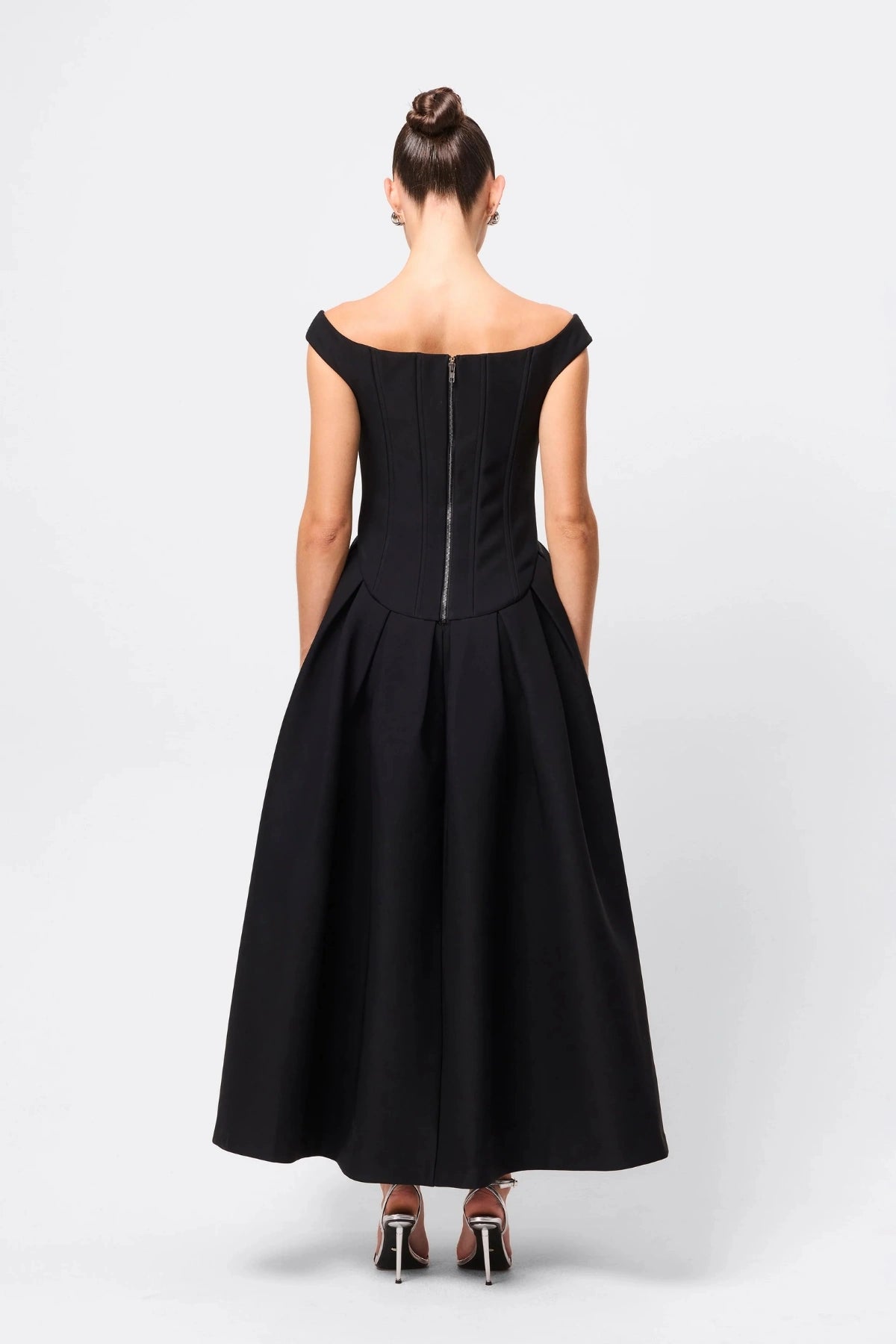 Adoration Maxi Dress Black by Mossman, off-shoulder corset maxi with pleated A-line skirt and pockets, a trendy piece perfect for formal events or evenings.