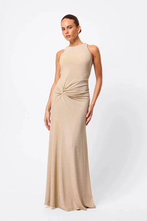 Adore You Maxi Dress by Mossman, a metallic jersey racer maxi with twist waist and fluid skirt that shimmers for weddings or evening events. 