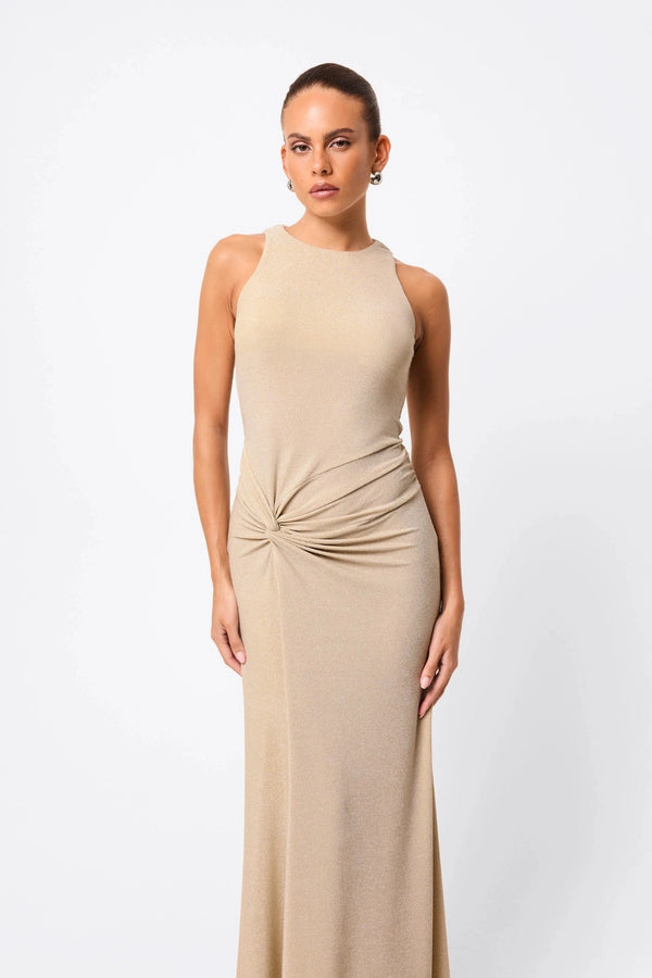Adore You Maxi Dress by Mossman, a metallic jersey racer maxi with twist waist and fluid skirt that shimmers for weddings or evening events. 