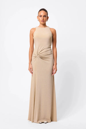 Adore You Maxi Dress by Mossman, a metallic jersey racer maxi with twist waist and fluid skirt that shimmers for weddings or evening events. 
