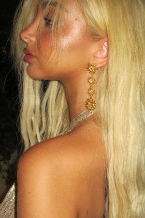 Aftersun Earrings Gold by Emma Pills – 18k gold-plated statement earrings with secure backing.