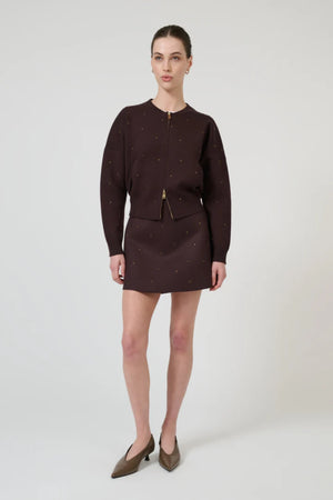 Agata Skirt Chocolate by Onte – crystal embellished mini skirt with structured knit fabric and A-line silhouette.