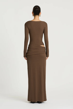 Agnes Maxi Dress in Chocolate by Benni, a ribbed long-sleeve maxi with deep plunge neckline, gathered bust, and subtle hip draping.