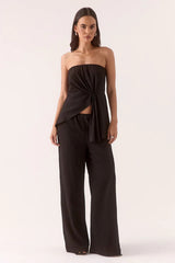 Aine Pants Black by Sovere – relaxed crinkle pants with a drawstring waist, straight leg, and pockets. Perfect for easy daily wear.