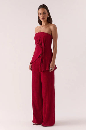 Aine Top in Raspberry by Sovere – strapless crinkle top with pleated waist and asymmetric hem. Perfect for bold, warm-weather looks.