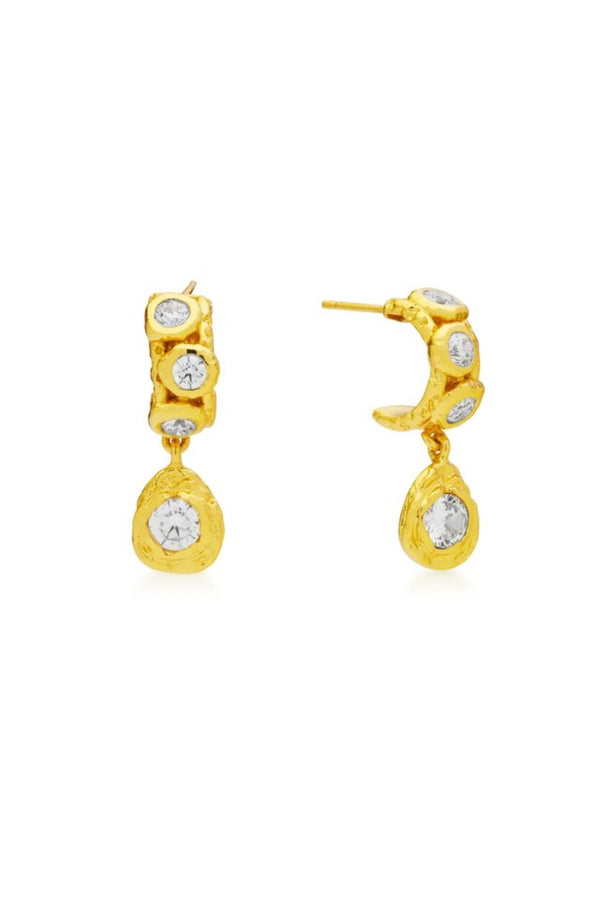 Alanya Earrings Crystal by Amber Sceats, gold-plated hoops with cubic zirconia detail, a trendy piece perfect for chic day wear or elegant evenings.