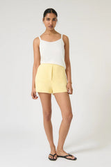 Aldara Shorts by Onte, butter yellow cotton pointelle knit mini shorts with a soft A-line fit, perfect for relaxed summer styling.