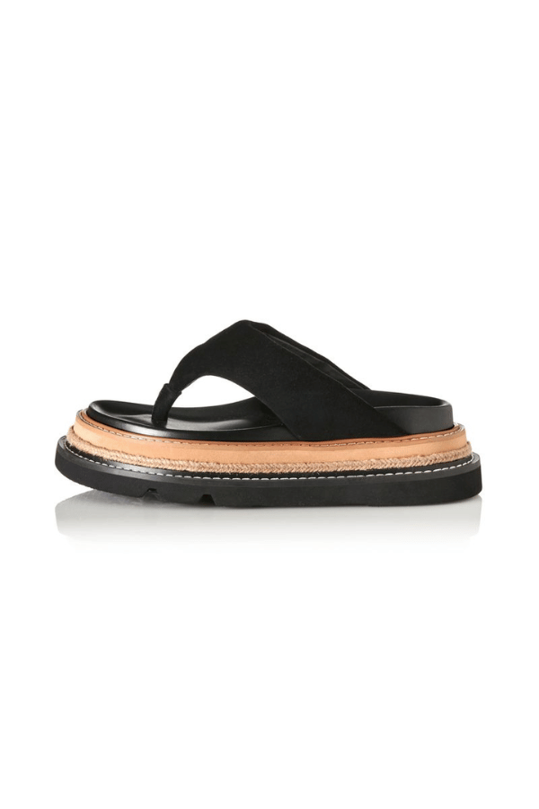 Alias Mae Vedi Sandal in Black Suede, a chic padded thong sandal with a raffia-wrapped chunky flatform. Perfect for modern summer looks.
