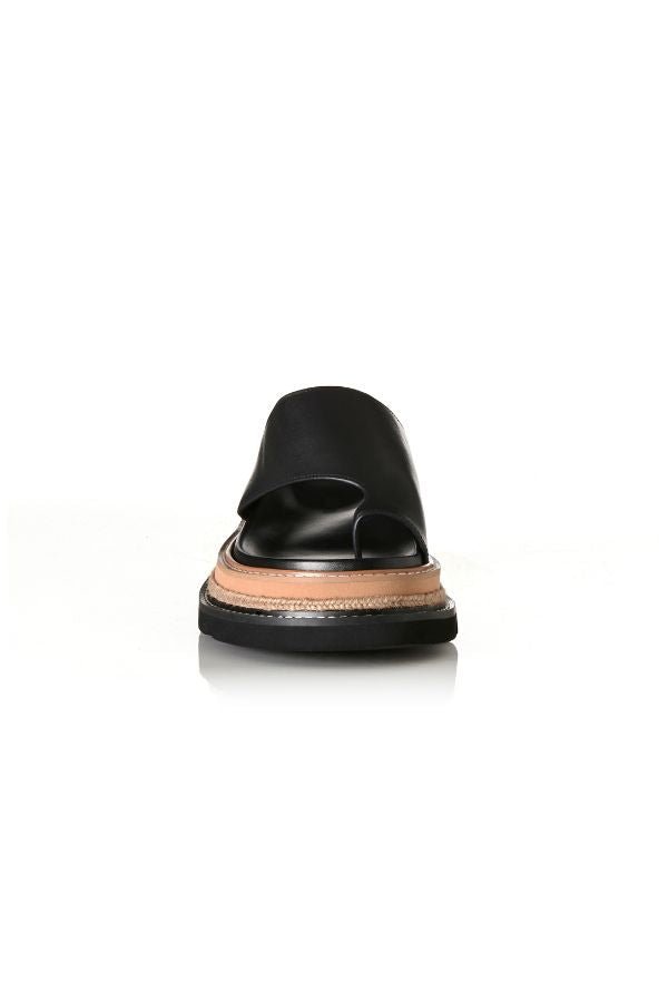Alias Mae Venetia Sandal in Black Leather, a sleek toe-loop design with chunky raffia-detailed sole for elevated summer style.