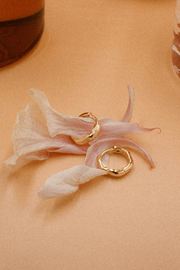 Alice Huggies by Avant Studio, gold huggie earrings with sleek minimal design. Perfect for everyday wear or layering looks.