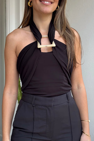 Allegra Top Black by Camilla and Marc – a halter top with resin detail and soft drape. Perfect for polished day-to-night styling.