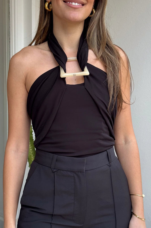 Allegra Top Black by Camilla and Marc – a halter top with resin detail and soft drape. Perfect for polished day-to-night styling.