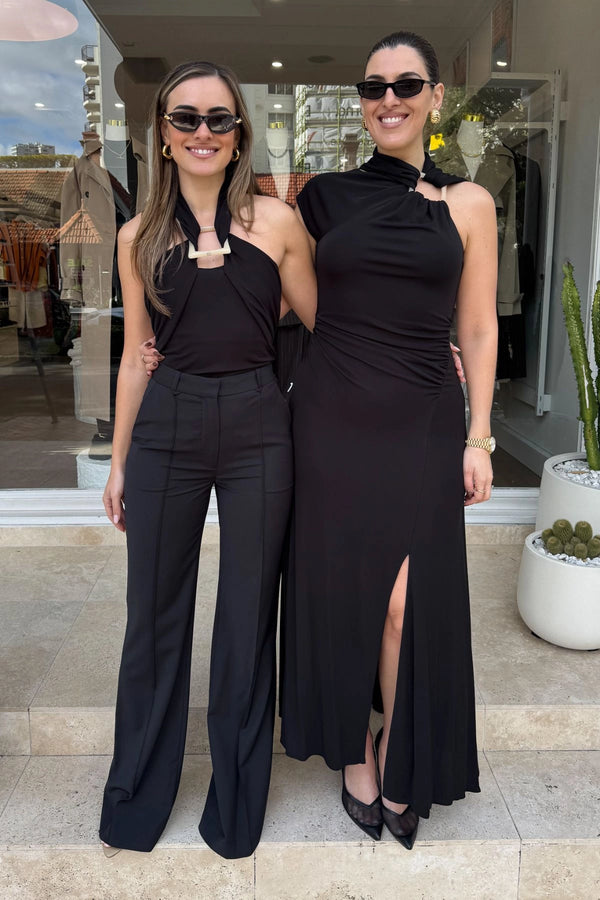 Allegra Top Black by Camilla and Marc – a halter top with resin detail and soft drape. Perfect for polished day-to-night styling.