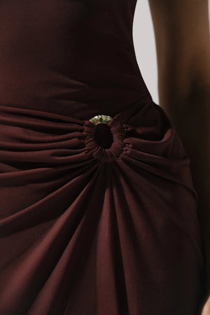 Allende Maxi Dress by Baobab, a one-shoulder gown with ring detail, asymmetrical hem, and side slit. Ideal for elegant evenings.