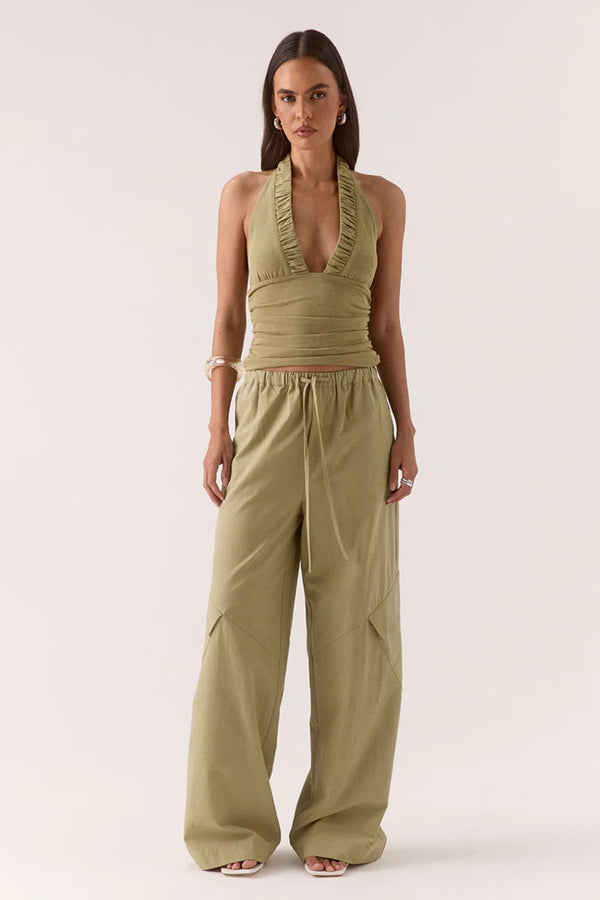 Alora Top Soft Olive by Sovere – halter mesh top with gathered details and back tie. Perfect for summer nights or elevated casual looks.