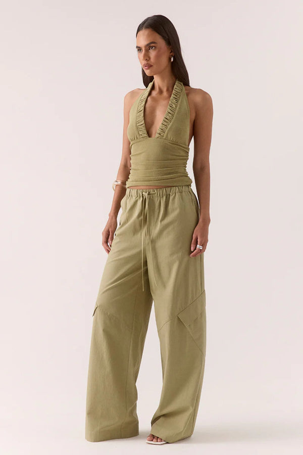 Alora Top Soft Olive by Sovere – halter mesh top with gathered details and back tie. Perfect for summer nights or elevated casual looks.
