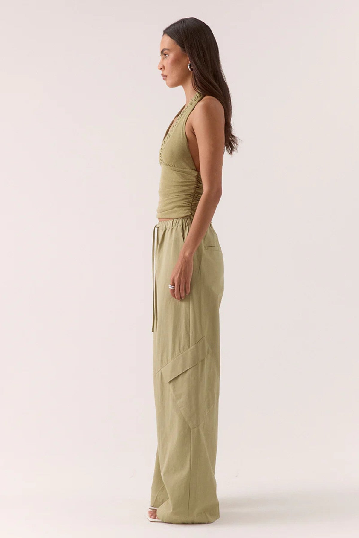Alora Top Soft Olive by Sovere – halter mesh top with gathered details and back tie. Perfect for summer nights or elevated casual looks.