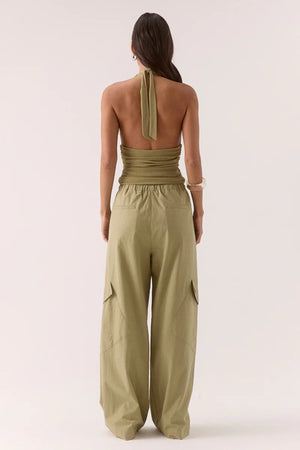 Alora Top Soft Olive by Sovere – halter mesh top with gathered details and back tie. Perfect for summer nights or elevated casual looks.