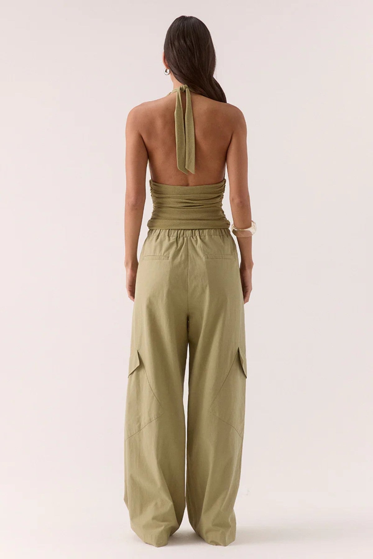 Alora Top Soft Olive by Sovere – halter mesh top with gathered details and back tie. Perfect for summer nights or elevated casual looks.