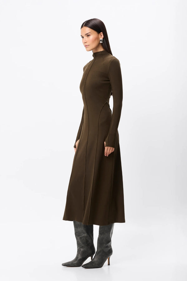 Amal Midi Dress Olive by Mossman – stretch jersey midi dress with long sleeves, thumbholes and A-line skirt.