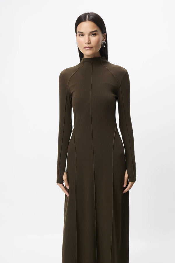 Amal Midi Dress Olive by Mossman – stretch jersey midi dress with long sleeves, thumbholes and A-line skirt.